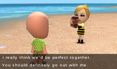 Kim and Hank on the beach. Kim presents Hank with a bunch of stacked chocolate squares and says 'I really think we'd be perfect together. You should definitely go out with me.'.