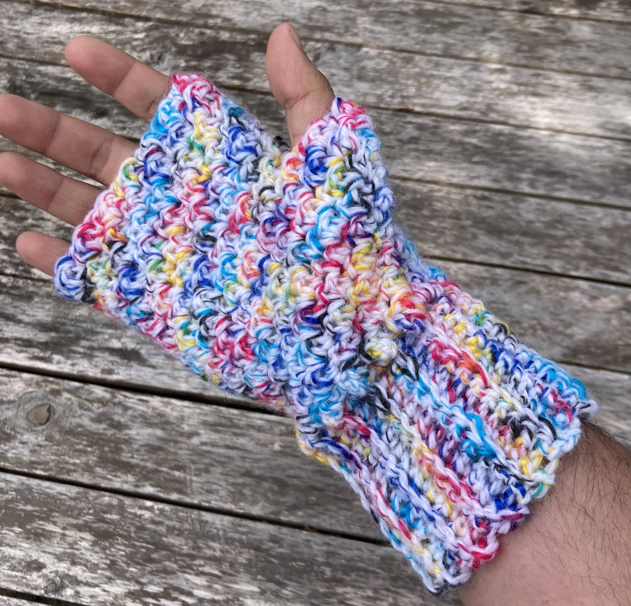 One of the gloves on my right hand, with the palm of my hand facing the camera.