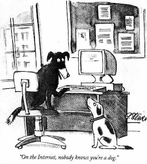 Cartoon of two dogs sitting around a large, old-school computer.