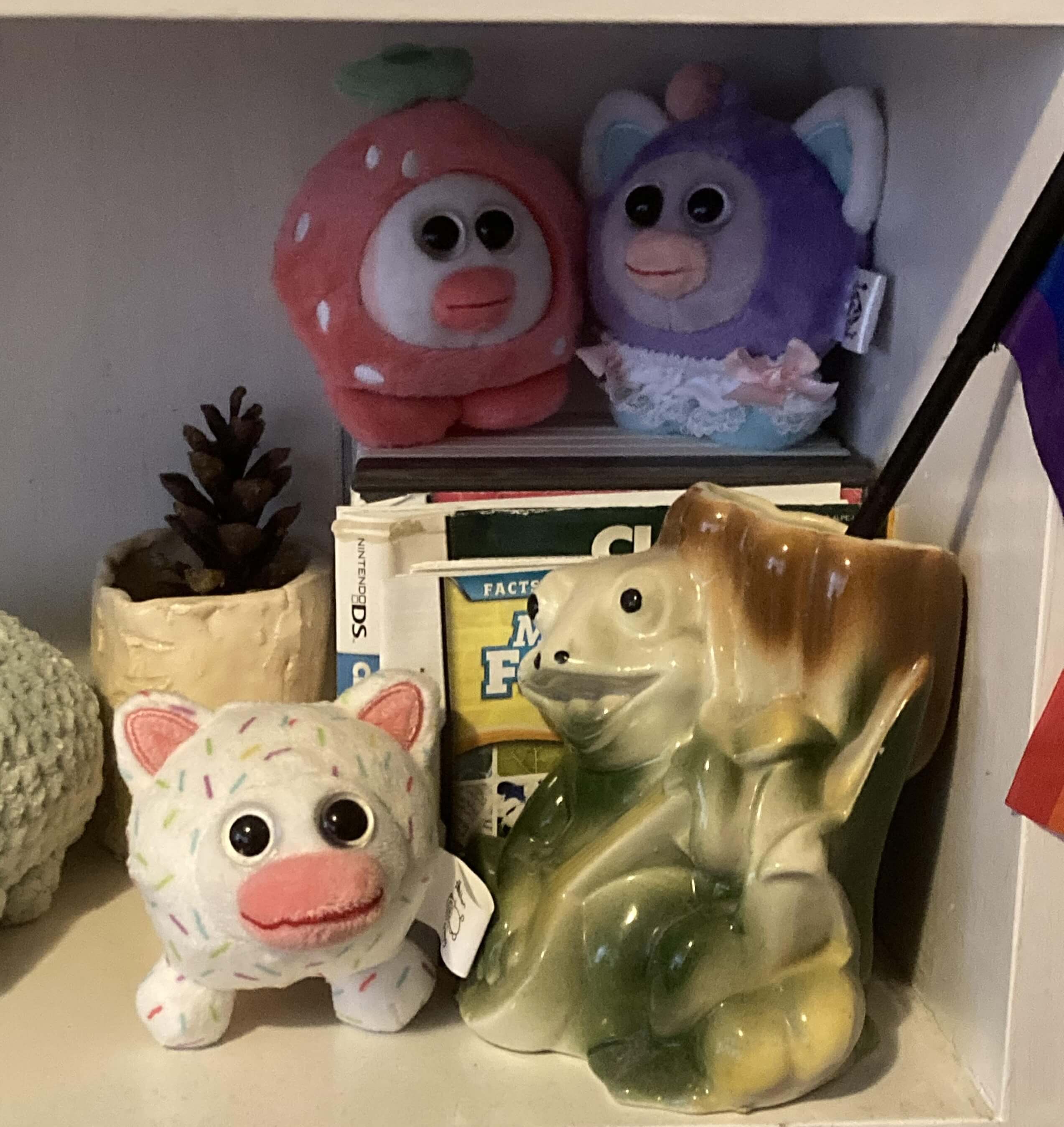 My itemLabel plushies on a shelf.